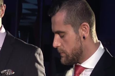 Two boyz In Suits Meet In A Bar